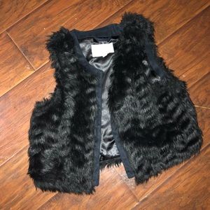 cropped black fur vest